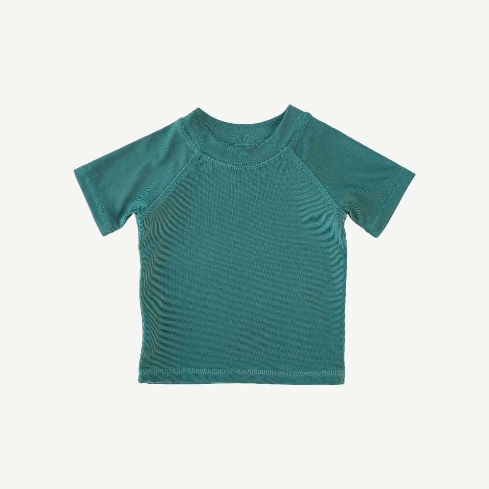 NWOT/EUC 2T Kate Quinn Short Sleeve Rash Guard Tee Sea Pine Teal Blue